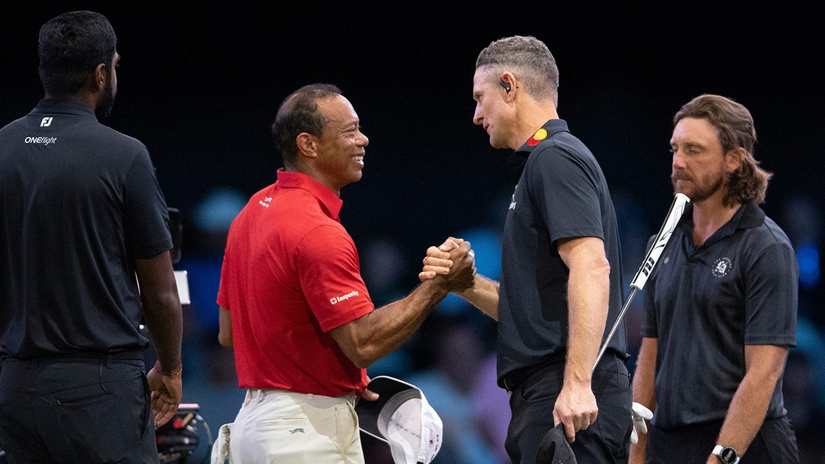 Tiger Woods and Justin Rose