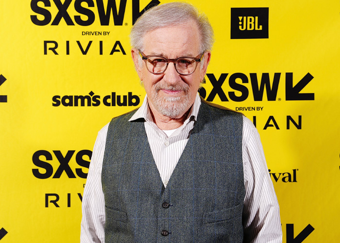 Steven Spielberg wearing glasses and a vest at SXSW event, ahead of Oscars controversy involving Timothée Chalamet as a sage. Steven Spielberg wearing glasses and a vest at SXSW event, ahead of Oscars controversy involving Timothée Chalamet as a sage.
