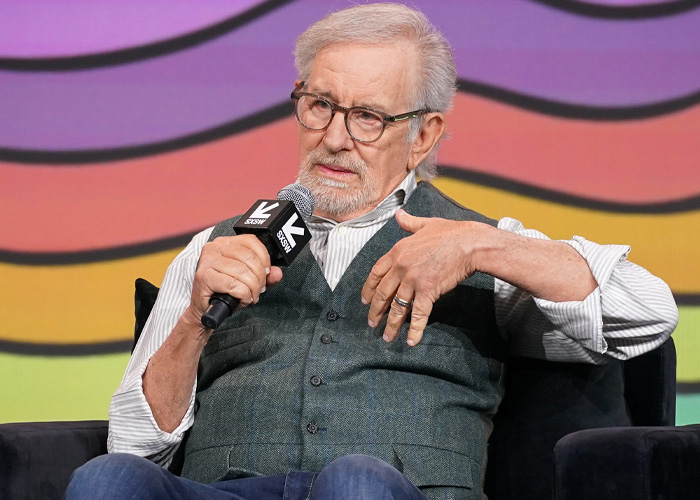 Steven Spielberg speaking into a microphone during SXSW panel, discussing Timothée Chalamet and film industry topics. Steven Spielberg speaking into a microphone during SXSW panel, discussing Timothée Chalamet and film industry topics.