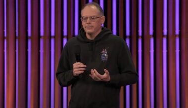 Tim Sweeney appears on stage during an Unreal Fest event.