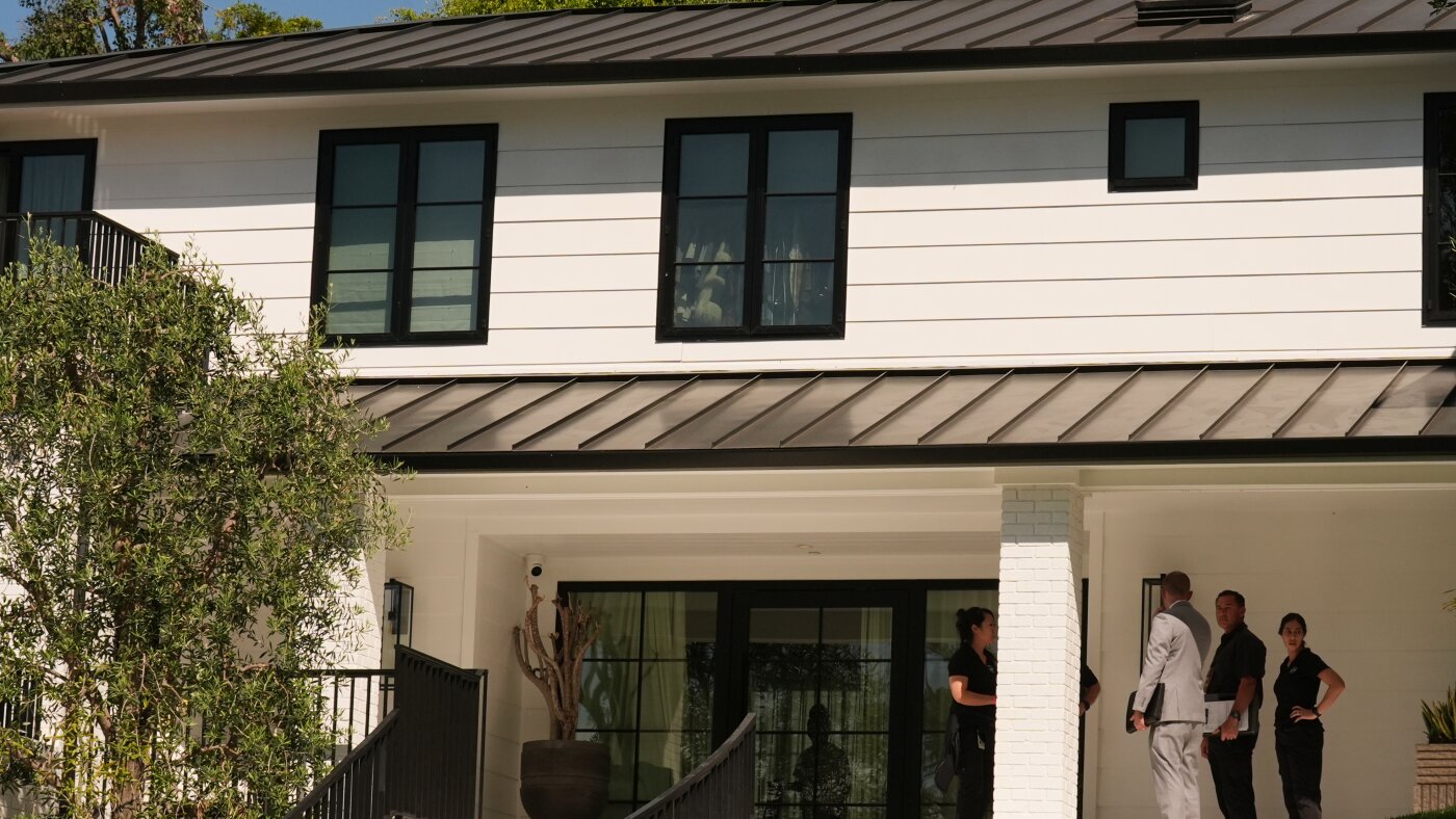 Prosecutor says Rihanna, family were home when woman charged with attempted murder fired : NPR