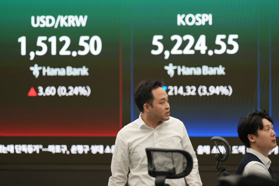 Asian shares decline as oil prices soar amid the war in Iran, echoing last week's Wall Street drop