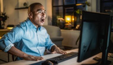 Investor reacting to Nvidia's stock price rising.