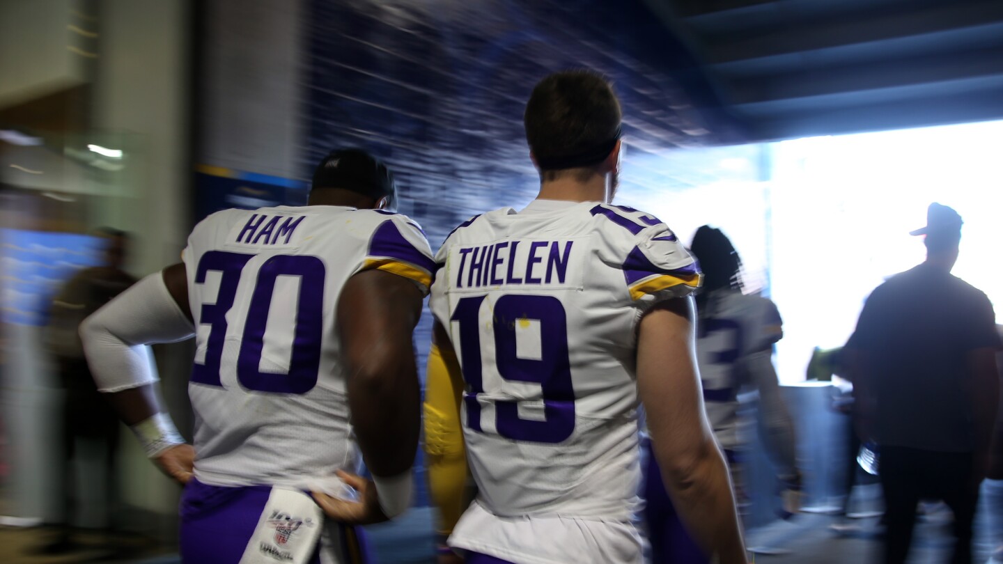 Adam Thielen, C.J. Ham sign retirement deals with Vikings