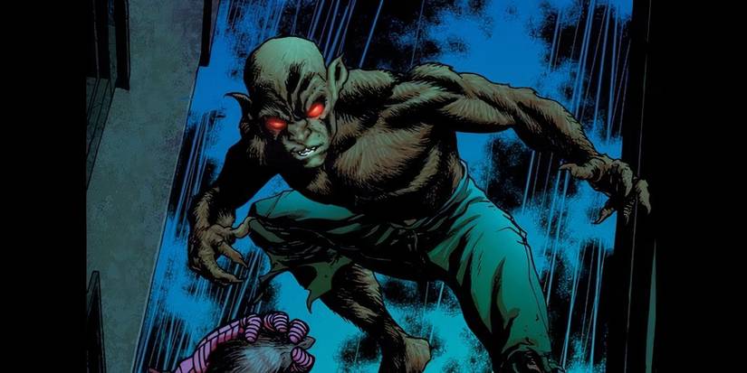 Vermin in a dark rainy alley with glowing red eyes in Marvel Comics