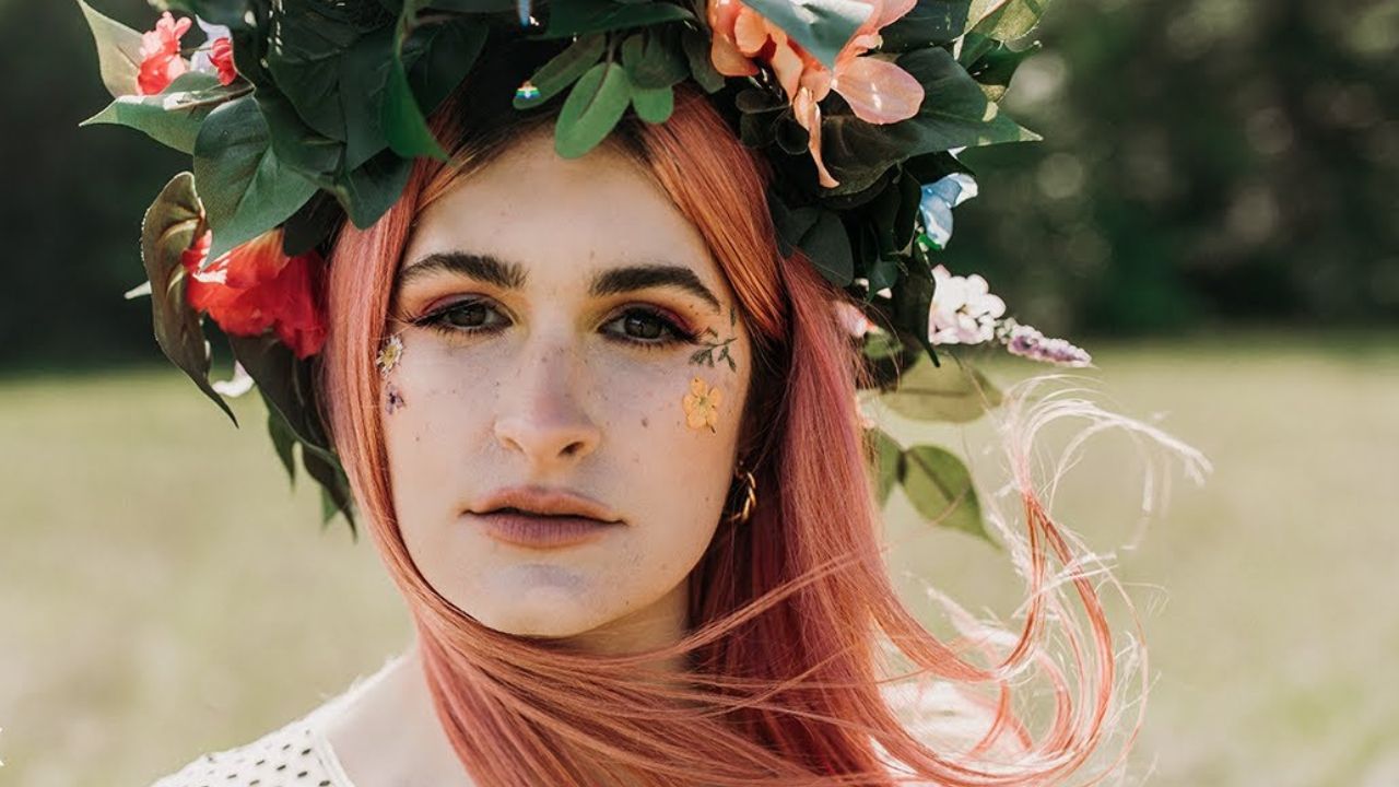 Courtney LaPlante with pink hair in a flower crown