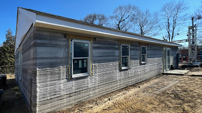 A side view of a 3-D printed home in progress