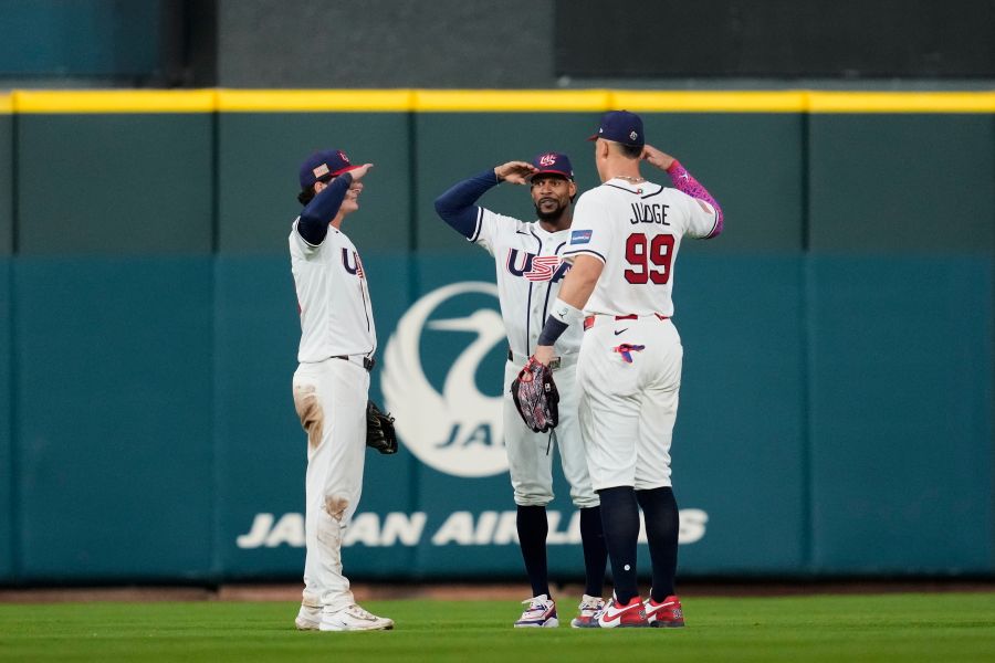 United States outfielders Roman Anthony, left to right, Byron Buxton and Aaron Judge celebrate after the team's victory over Mexico in a World Baseball Classic game, Monday, March 9, 2026, in Houston. (AP Photo/Ashley Landis)