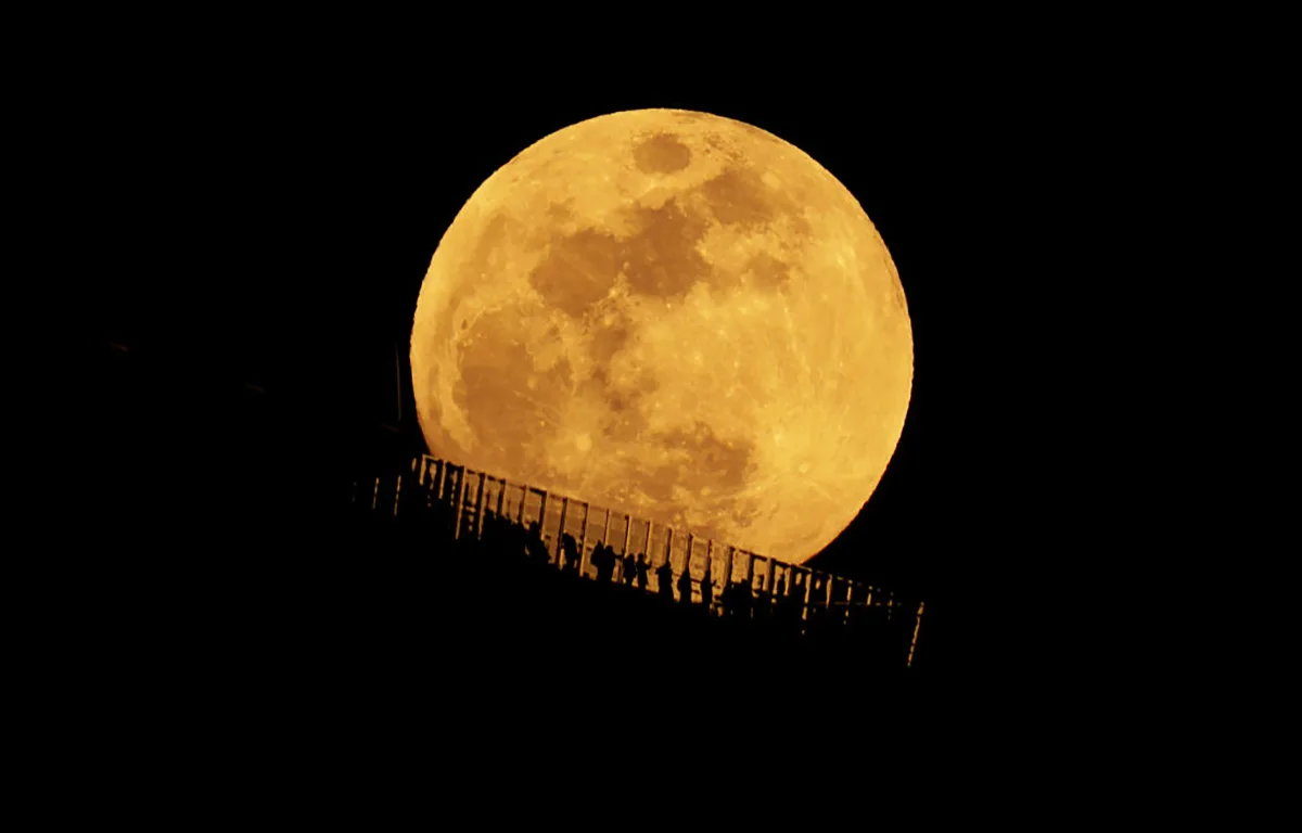 The 2026 Worm Moon rises behind the Edge outdoor observation deck at Hudson Yards in New York City, 2 March 2026. Credit: Gary Hershorn/Getty Images