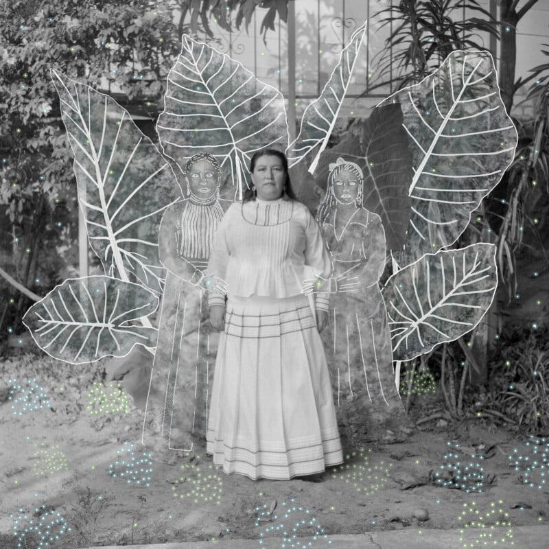 A woman stands outside wearing a long skirt and blouse, surrounded by large hand-drawn leaves and two sketched female figures. Light blue dots accent the ground, blending illustration with the black-and-white photo.