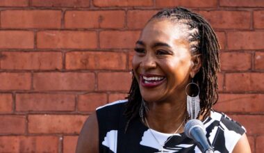 Indiana Fever legend Tamika Catchings gives a speech Wednesday, July 16, 2025, during the ribbon-cutting ceremony for a mural of Catchings in the Mass Ave neighborhood in Indianapolis. Muralist Nate Baranowski and apprentice Brooke McGee worked on the mural that portrays Catchings’ impact in Indianapolis.