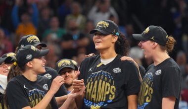 Apr 5, 2026; Phoenix, AZ, USA; UCLA Bruins center Lauren Betts (51) celebrates on the podium after defeating the South Carolina Gamecocks during the National Championship game of the women's 2026 NCAA Tournament at Mortgage Matchup Center. Mandatory Credit: Joe Camporeale-Imagn Images