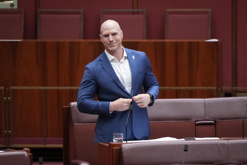 David Pocock stands in the Senate.