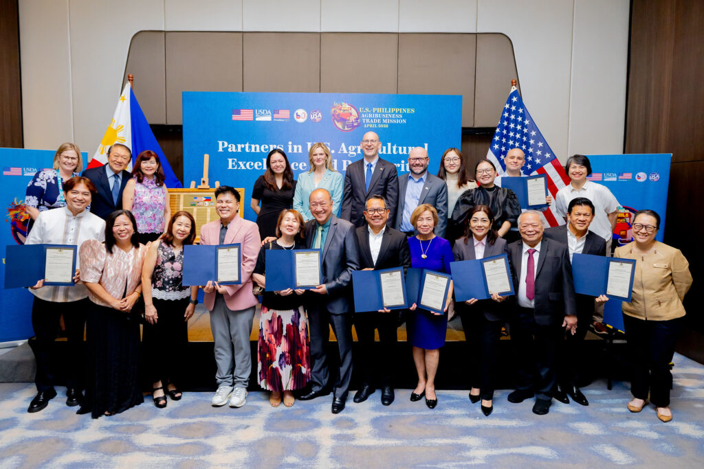 USDA Under Secretary Bekkering and Chargé d'Affaires Ewing present certificates to eight Filipino organizations as Key Partners in U.S. Agricultural Excellence and Prosperity. 