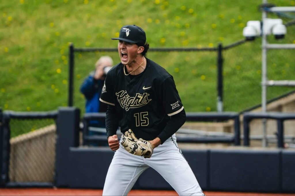 UCF pitcher Camden Wicker celebrates in UCF's game against West Virginia.
