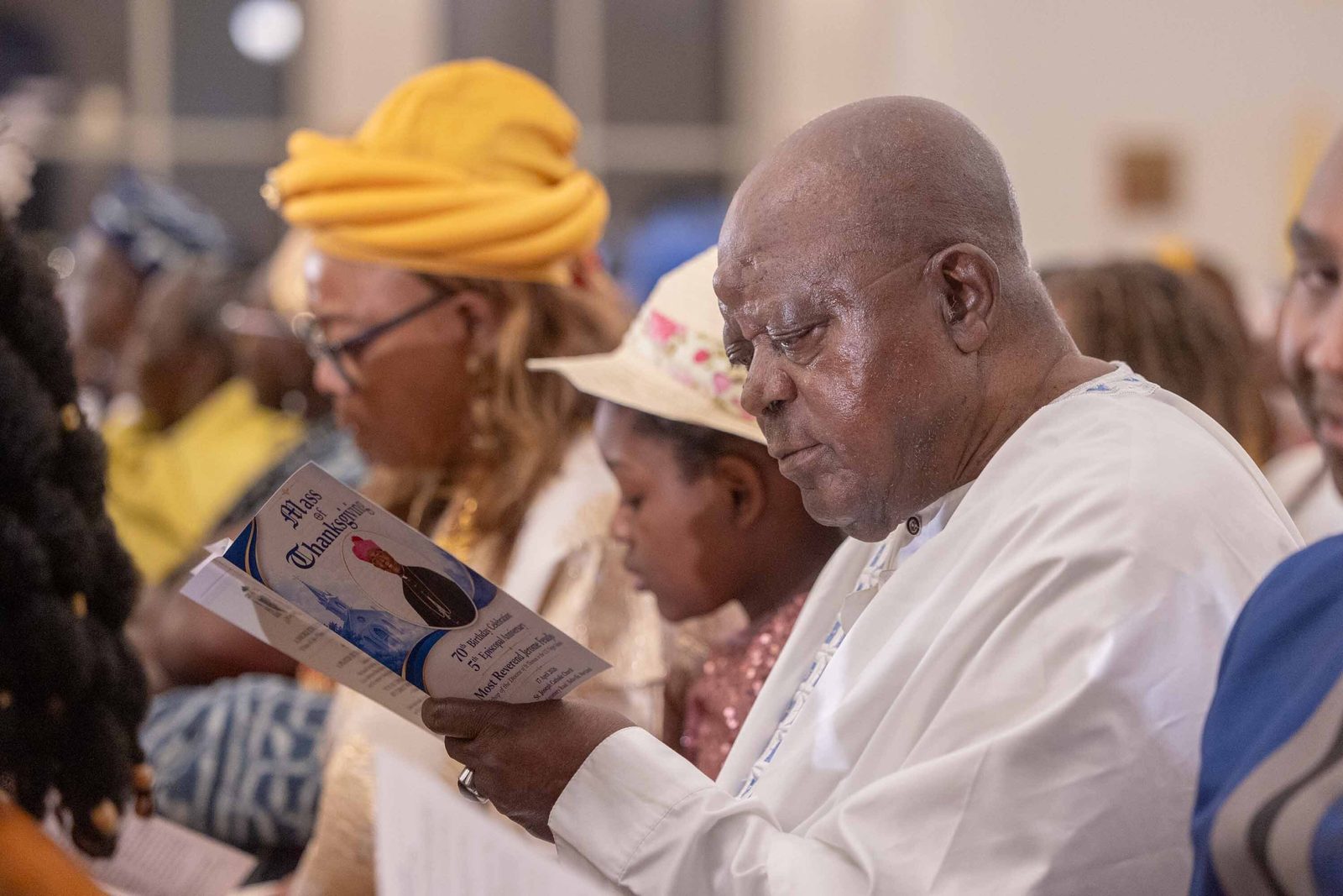People wear traditional African dress during a Mass of Thanksgiving at St. Joseph Catholic Church in Beltsville, Maryland, on April 17, 2026 that commemorated the 70th birthday of Bishop Jerome Feudjio of the Diocese of St. Thomas in the U.S. Virgin Islands and his fifth anniversary leading that diocese. Bishop Feudjio is a native of the African nation of Cameroon, which Pope Leo XIV visited that week. (Catholic Standard photos by Mihoko Owada)
