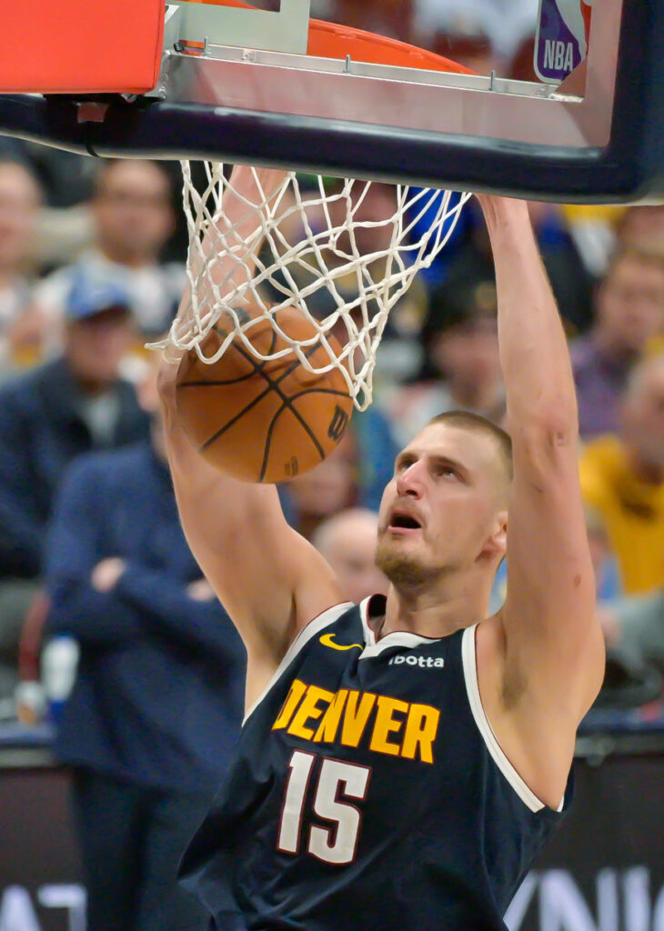 Denver Nuggets center Nikola Jokic (15) dunks the ball in game 5 against the Timberwolves at Ball Arena on Monday, April 28, 2026. The Nuggets defeated the Timberwolves 125-113. (The Gazette, Jerilee Bennett)