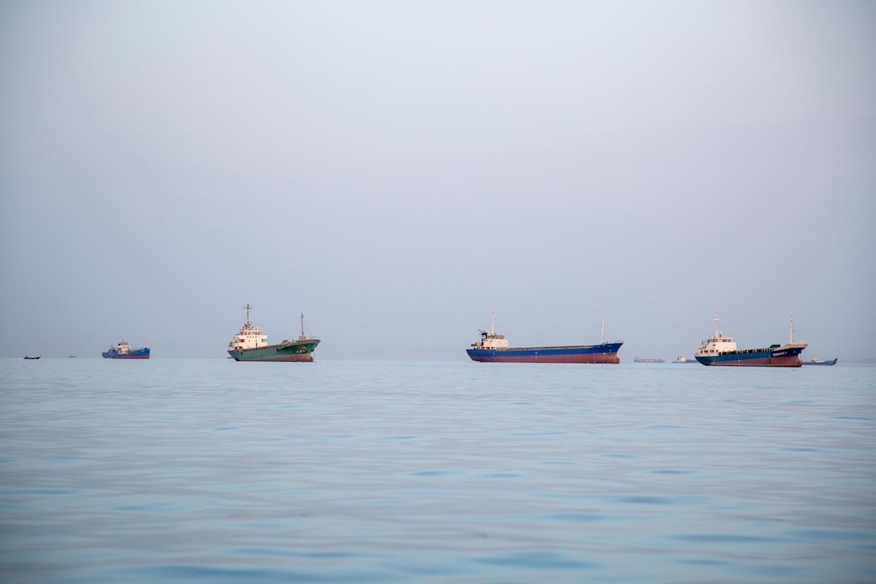 Getty Images - PHOTO: Ships are anchored along the shoreline of the Persian Gulf and Strait of Hormuz, April 22, 2026 in Bandar Abbas, Iran.