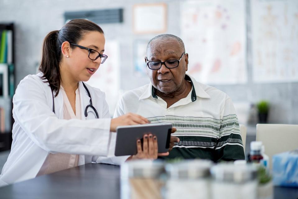 Doctor going over results with a patient.