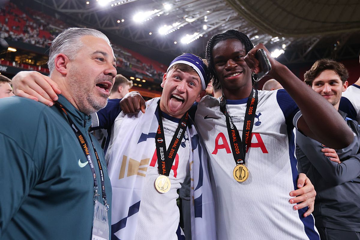 Mikey Moore celebrates Tottenham's Europa League win with Callum Olusesi
