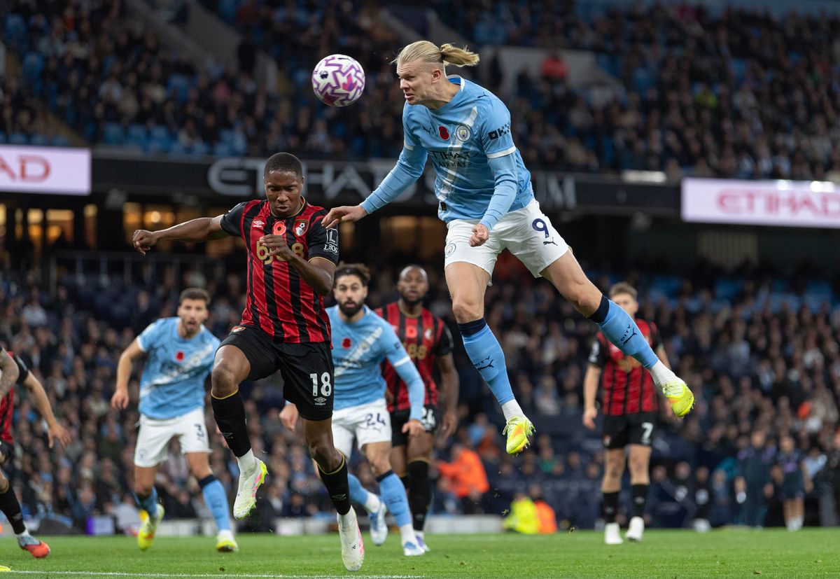 MANCHESTER, ENGLAND - NOVEMBER 2: Erling Haaland of Manchester City rises above Bafode Diakite of AFC Bournemouth to head towards goal during the Premier League match between Manchester City and Bournemouth at Etihad Stadium on November 2, 2025 in Manchester, England. (Photo by Visionhaus/Getty Images)