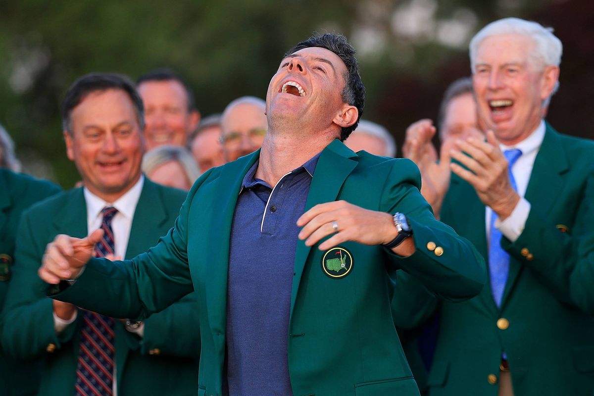 AUGUSTA, GEORGIA - APRIL 13: Rory McIlroy of Northern Ireland reacts after receiving the Green Jacket following his victory in a playoff during the final round of the 2025 Masters Tournament at Augusta National Golf Club on April 13, 2025 in Augusta, Georgia. (Photo by David Cannon/Getty Images)