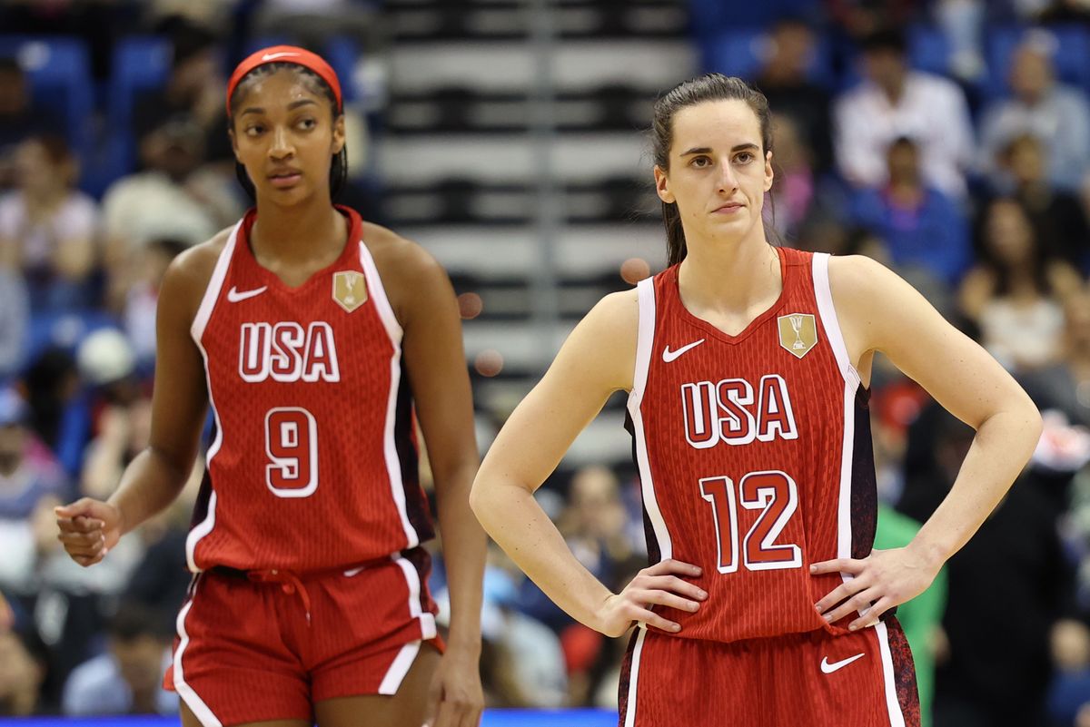 Angel Reese #9 and Caitlin Clark #12 of the USA Women's National Team look on during the game against Puerto Rico during the 2026 FIBA World Cup Qualifying Tournament on March 12, 2026 at Coliseo Jose Miguel Agrelot in San Juan, Puerto Rico