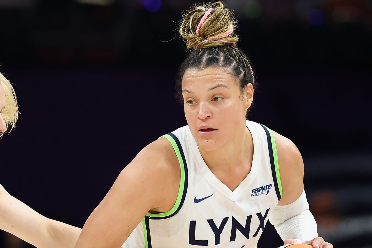 Kayla McBride #21 of the Minnesota Lynx handles the ball against Sami Whitcomb #33 of the Phoenix Mercury during the first half of Game Four of the 2025 WNBA Playoffs semifinals at PHX Arena on September 28, 2025 in Phoenix, Arizona