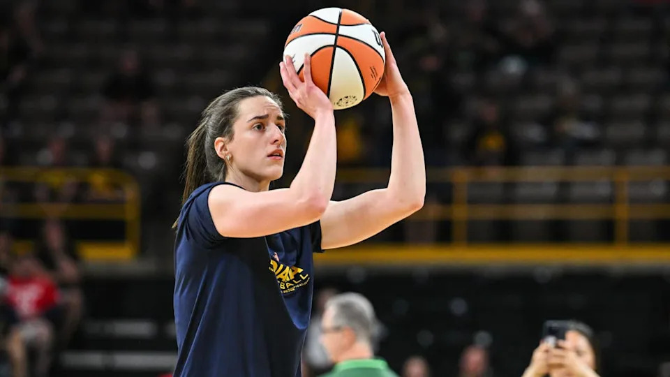 Indiana Fever guard Caitlin Clark warms up before a WNBA game.Jeffrey Becker-Imagn Images