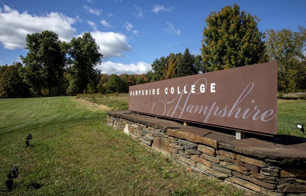 The Hampshire College sign at the campus entrance. (Robin Lubbock/WBUR)