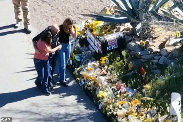 Savannah, her sister Annie, and her brother-in-law Tommaso Cioni are seen visiting the growing memorial outside of Nancy's home on March 2