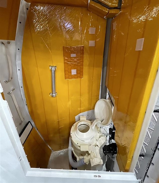 A mockup of the Artemis II toilet on board the Orion space capsule named Integrity