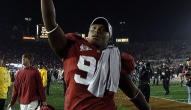 Luther Davis, a defensive lineman on the Crimson Tide's 2009 championship team (pictured), would allegedly show up at loan closings 'dressed in disguise' with a fake driver's license