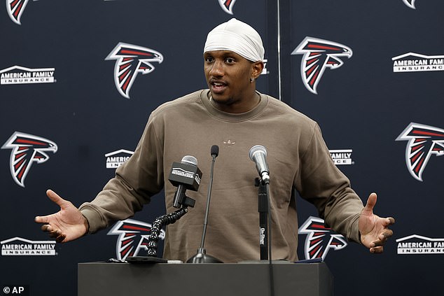 Michael Penix was among the players impersonated by Davis, according to one report