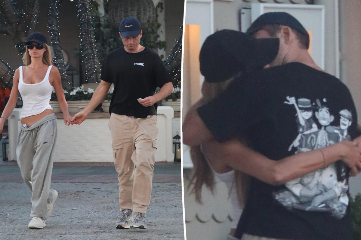 Brooks Nader and Taron Egerton kiss during LA date night