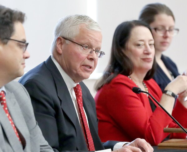 University of Wisconsin System President Jay Rothman speaks during a meeting of the UW Board of Regents on the campus of UW-Madison in Madison, Wis., on Dec. 7, 2023. At center right is Regent President Karen Walsh. (John Hart/Wisconsin State Journal via AP, File)