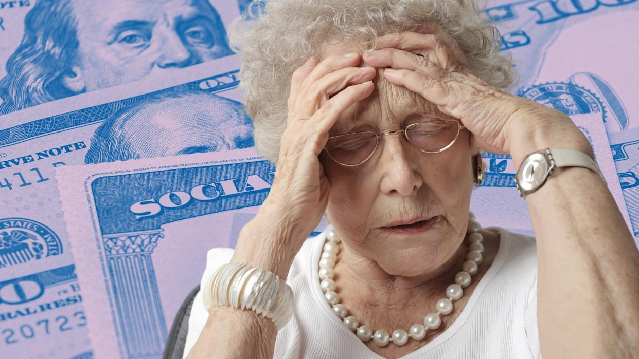 An elderly woman with gray hair and glasses holds her head in her hands, eyes closed, expressing deep distress. She wears a white top, a pearl necklace, a white segmented bracelet on her left wrist, and a white watch on her right. The background is a blue-tinted collage of U.S. one-hundred dollar bills and partial Social Security cards, with the word 'SOCIAL' clearly visible.