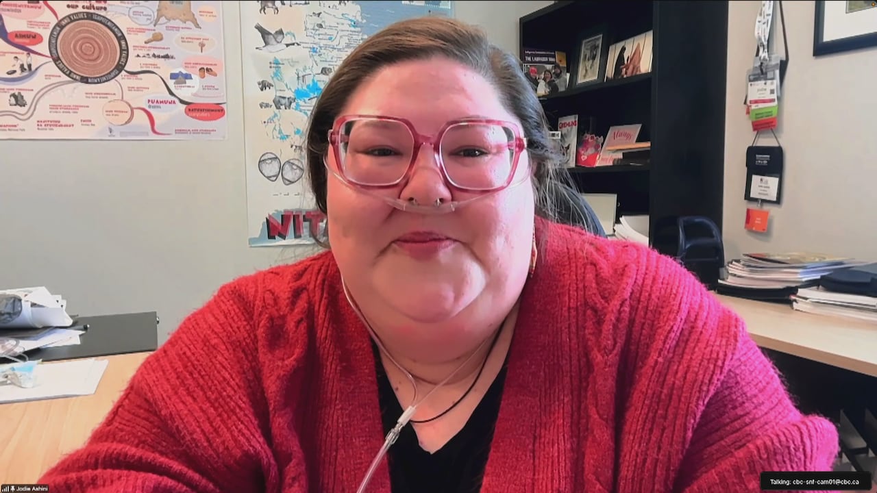 Woman smiles in zoom photo