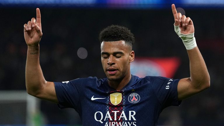 PSG's Desire Doue celebrates after scoring the opening goal against Liverpool