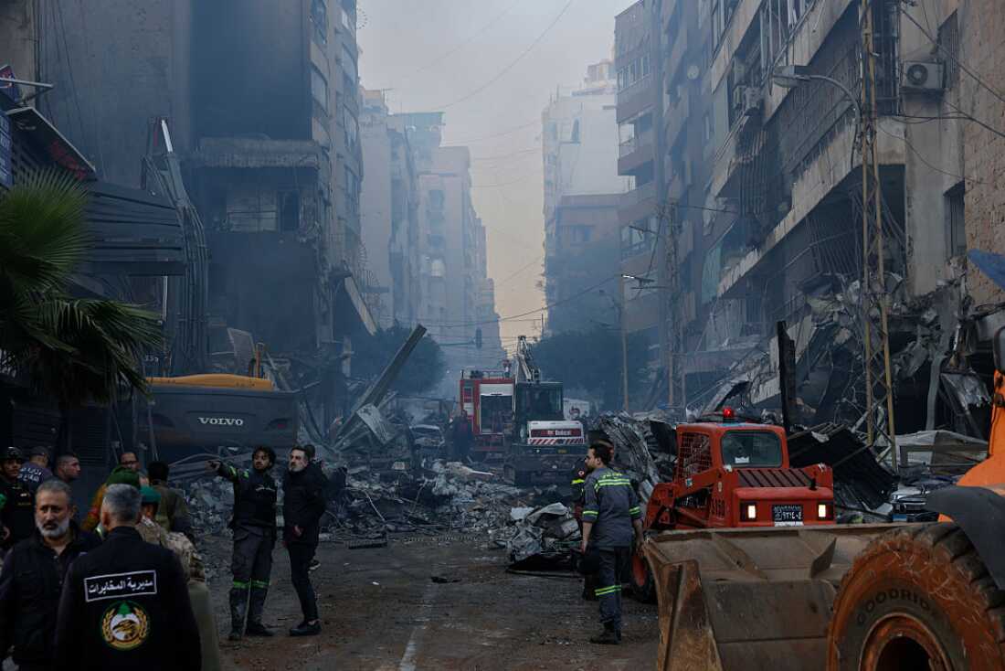 Rescue workers search for people after an Israeli attack hit a residential building in the Corniche al Mazraa neighborhood on April 8, 2026 in Beirut, Lebanon.