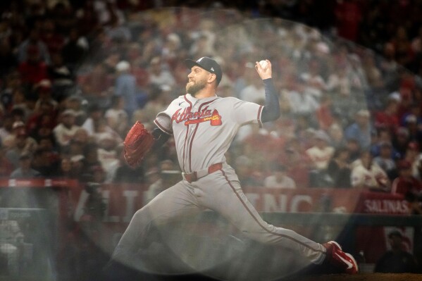Atlanta Braves pitcher Dylan Lee delivers during the sixth inning of a baseball game against the Los Angeles Angels, Tuesday, April 7, 2026, in Anaheim, Calif. (AP Photo/Ethan Swope, File)