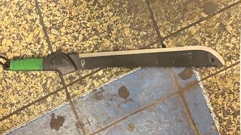 NYPD Crime Stoppers photograph of the long knife, described as a...