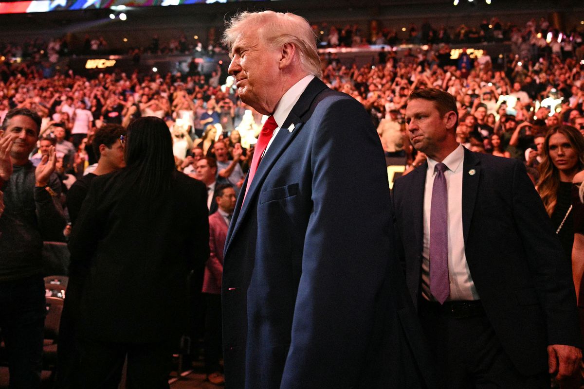 Trump was booed when he walked into the arena