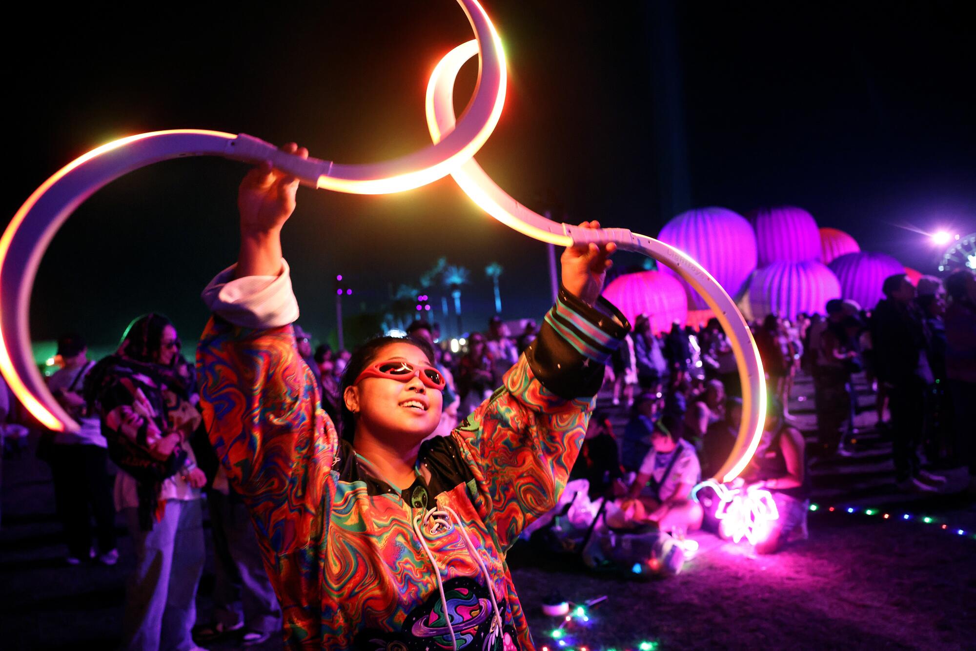 Ricaviannca Del Mundo of Los Angeles dances during Justin Bieber's performance.