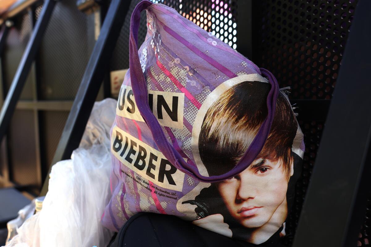 INDIO, CA, APRIL 11, 2026: Justin Bieber fans camp out at the Coachella stage at the Coachella Valley Music and Arts Festival at the Empire Polo Club in Indio on Saturday, April 11, 2026. (Christina House / Los Angeles Times)