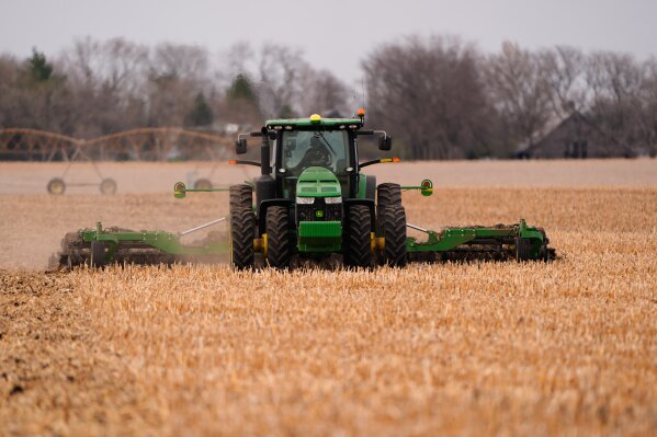 Dalton Bartek works a field to prepare for planting soybeans on his family's farm near Wahoo, Neb., on Monday, April 6, 2026. (AP Photo/Charlie Riedel)