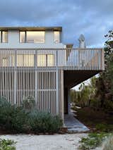 La Dallman created "breakaway" walls made of metal and recycled plastic that are designed to give under the force of a storm, providing protection to the foundation.