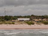 They Turned Soviet-Era Military Bunkers Into a Glass-Walled Multigenerational Home - Photo 1 of 17 -