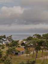 They Turned Soviet-Era Military Bunkers Into a Glass-Walled Multigenerational Home - Photo 2 of 17 -