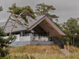 They Turned Soviet-Era Military Bunkers Into a Glass-Walled Multigenerational Home - Photo 6 of 17 -